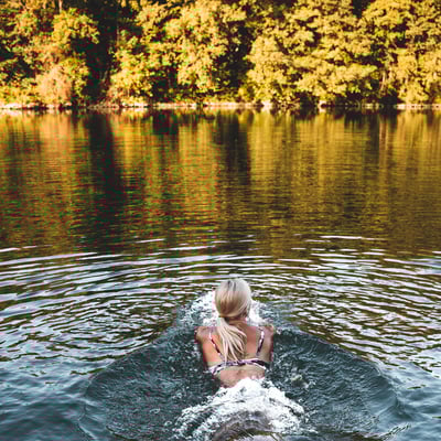 Girl swimming in lake